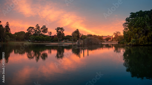 Fototapeta Naklejka Na Ścianę i Meble -  Spectacular Lakeside Sunset Panorama with Reflections