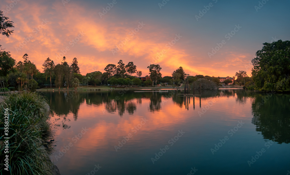 Spectacular Lakeside Sunset Panorama with Reflections