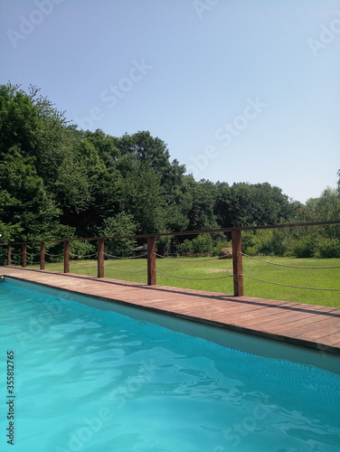 blue water pool in the forest