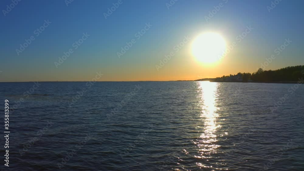 Beautiful Russian nature at sunset. View of the beach, forest and blue sea. Aerial video of nature. Beautiful Russian nature at sunset. View of the beach, forest and blue sea. Aerial video of nature.