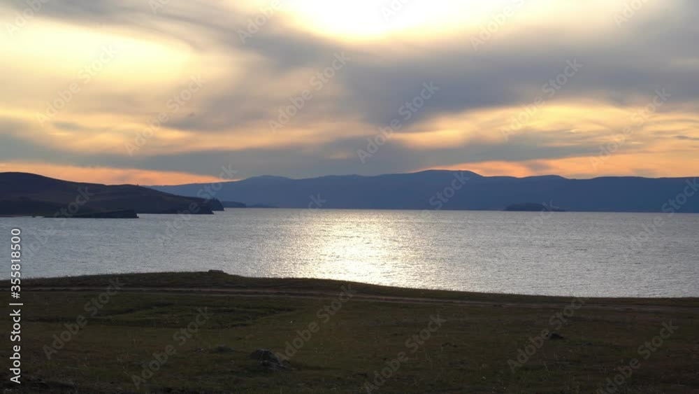 Sunset over lake Baikal on Olkhon Island, Siberia, Russia Sunset over lake Baikal on Olkhon Island, Siberia, Russia