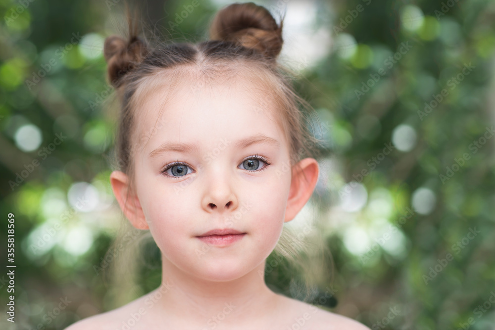 Adorable little girl taken closeup outdoors in summer. High quality photo Adorable little girl taken closeup outdoors in summer. High quality photo