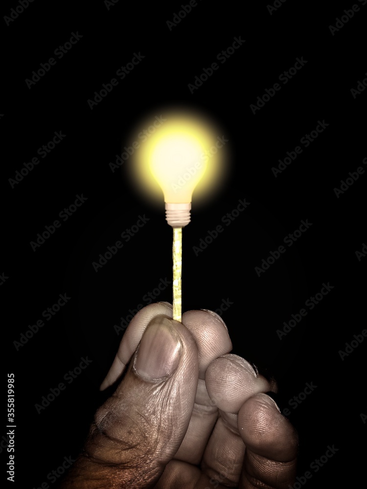 hand holding a light bulb hand holding a light bulb