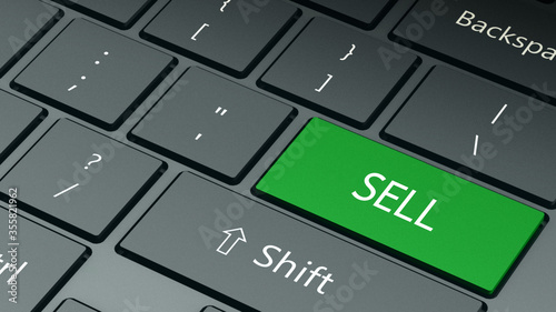  computer keyboard with special green sell key close up