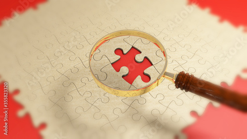 magnifying glass on a missing piece of jigsaw puzzle