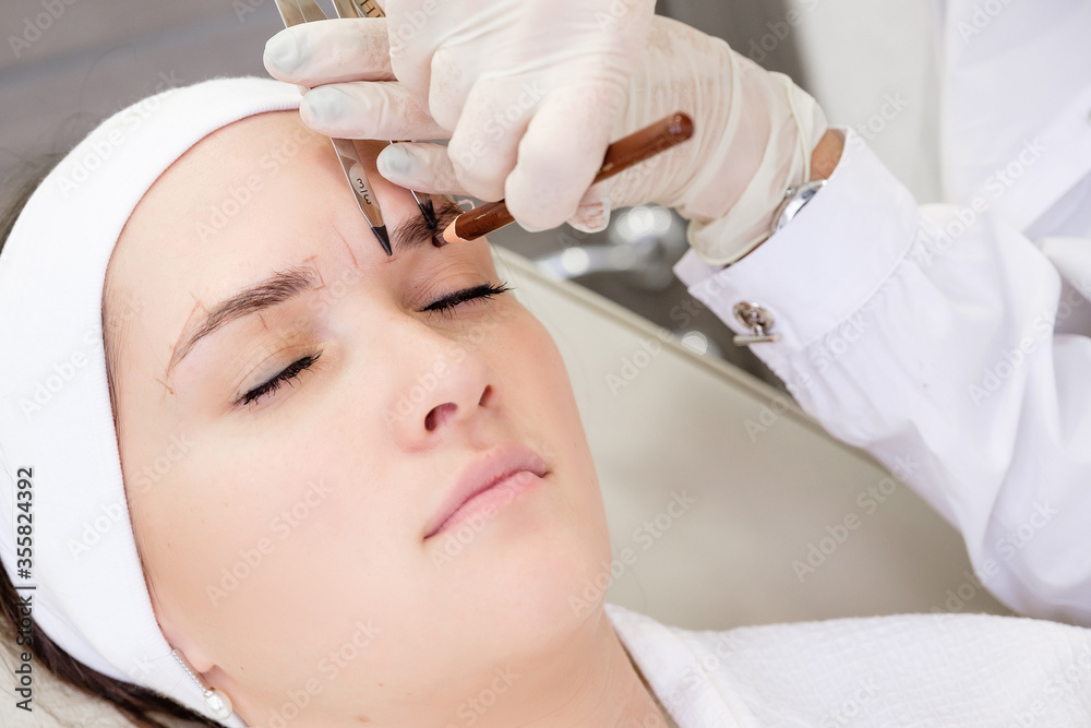 Microblading and eyebrow tattoo concept. Procedures in the spa concept Microblading and eyebrow tattoo concept. Procedures in the spa concept