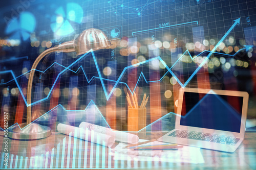 Wallpaper Mural Double exposure of chart and financial info and work space with computer background. Concept of international online trading. Torontodigital.ca