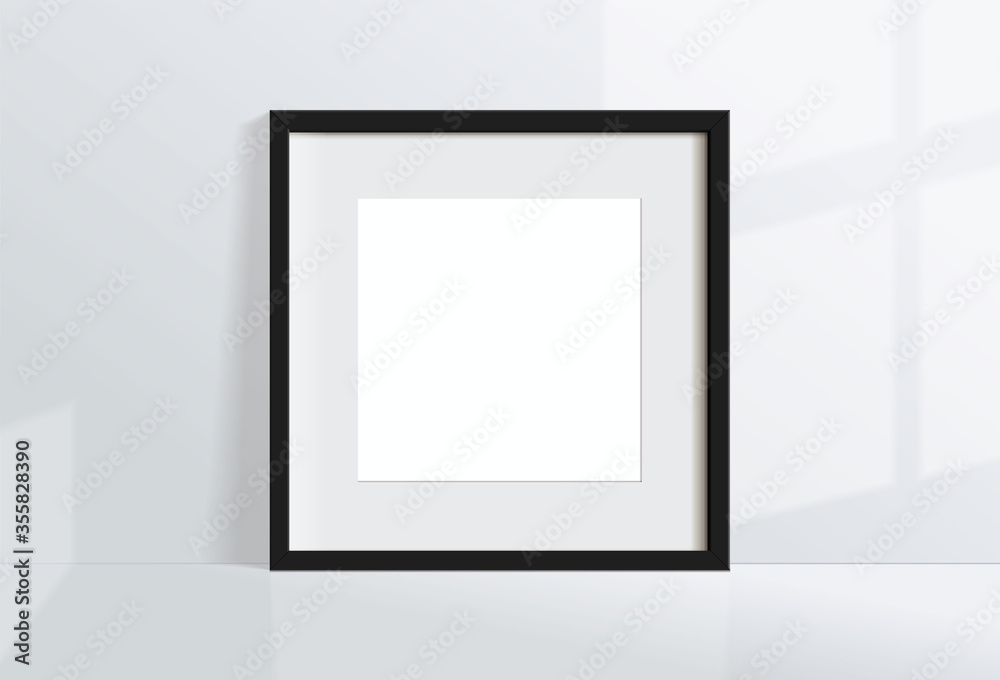 Minimal empty square black frame picture mock up hanging on white wall ...