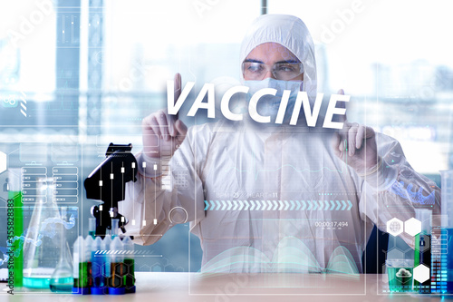 Man doctor working on coronavirus covid-19 vaccine © Elnur