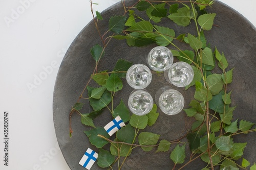 Fotografie Flat lay image of Finnish schnapps with flag