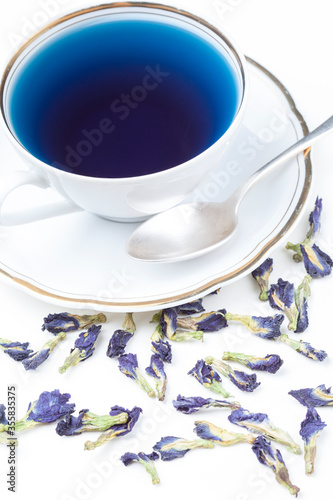 Fototapeta Naklejka Na Ścianę i Meble -  Chang Shu purple flower tea for healthy drinking, detoxification, weight loss on a white background in a white porcelain cup
