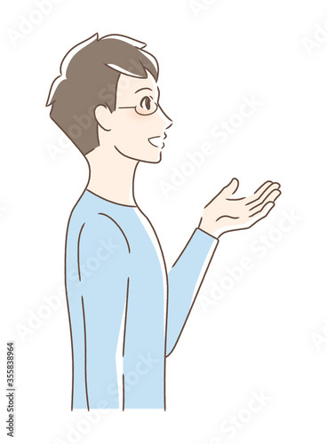 笑顔で手を差し出す男性の横顔
