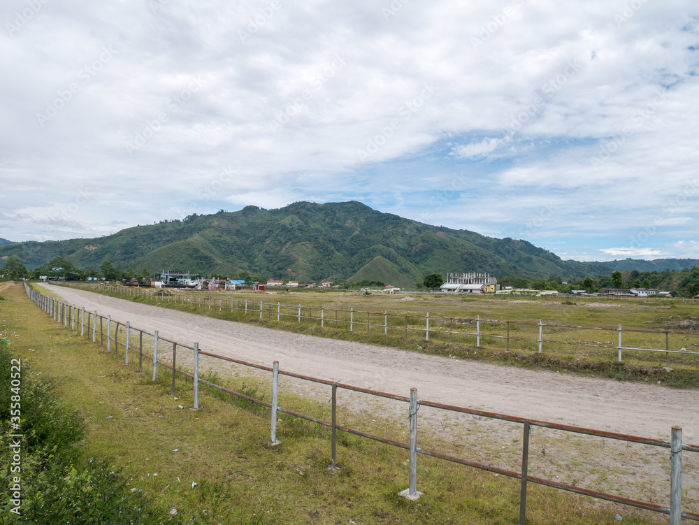 Traditional Horse Race Track in the Meadow. Located in Takengon, Aceh, Indonesia.