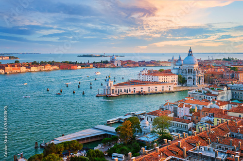 Aerial view of Venice lagoon and Santa Maria della Salute church on sunset. Venice, Italy