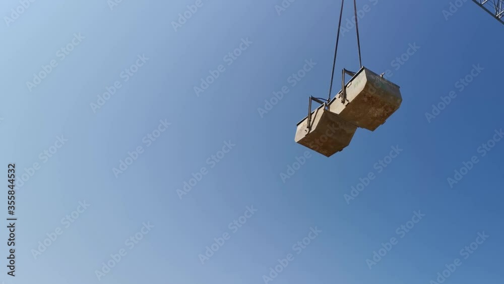 High Industrial Tower Crane Moving the Containers High Industrial Tower Crane Moving the Containers