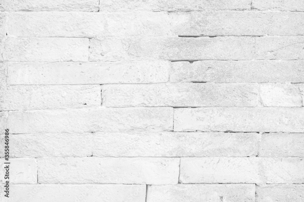 Fototapeta premium White brick wall texture background in room at subway. Brickwork stonework interior, rock old clean concrete grid uneven abstract weathered bricks tile design, horizontal architecture wallpaper.