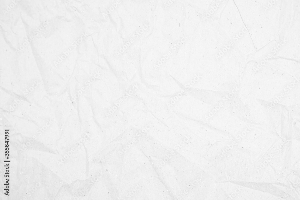 White recycled craft paper texture as background. Grey paper tex White recycled craft paper texture as background. Grey paper tex
