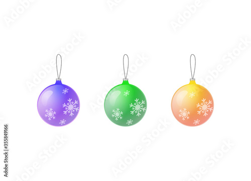 Set of Christmas glass balls of different colors with snowflakes on a white background.
