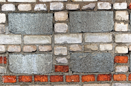 Texture of old brickwork with silicate block in the mud