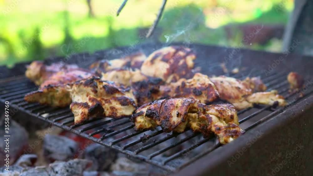 The grill season is open. Grilled turkey on backyard. The grill season is open. Grilled turkey on backyard.