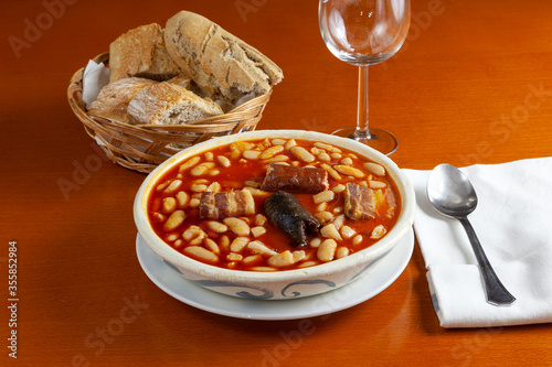 Plato de fabada asturiana servido en la mesa  photo