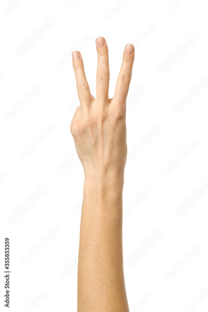 Number three. Woman hand gesturing isolated on white Number three. Woman hand gesturing isolated on white