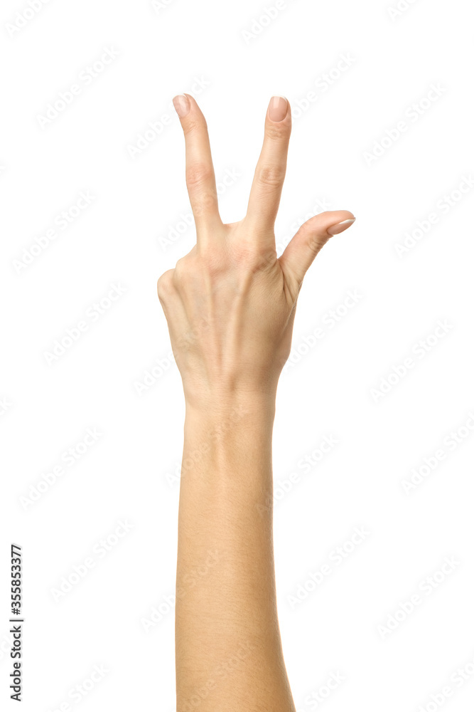 Number three. Woman hand gesturing isolated on white Number three. Woman hand gesturing isolated on white
