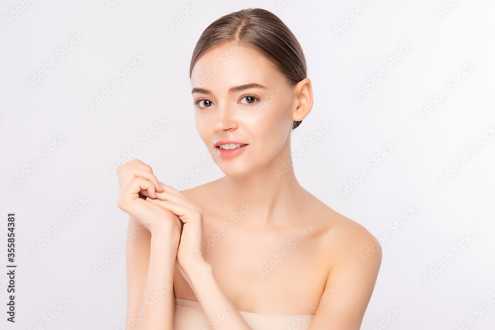 Beauty Woman face Portrait, Beautiful Young Woman with Clean Fresh Healthy Skin, Facial treatment. Cosmetology, beauty and spa, isolated on white background Beauty Woman face Portrait, Beautiful Young Woman with Clean Fresh Healthy Skin, Facial treatment. Cosmetology, beauty and spa, isolated on white background