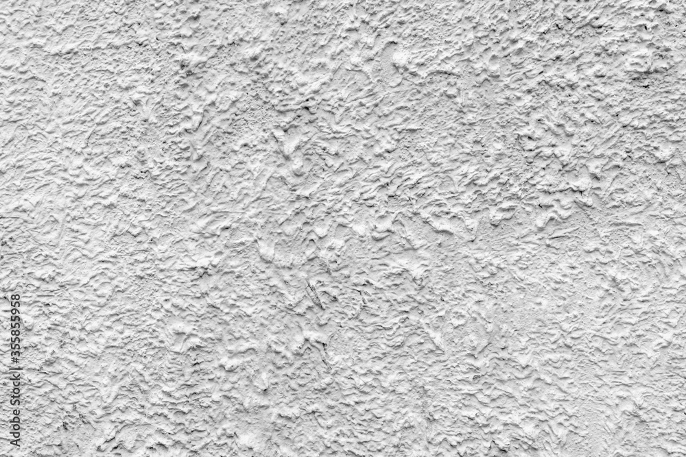 Gray rough plaster. Abstract building background. Surface of wall of building. Gray rough plaster. Abstract building background. Surface of wall of building.