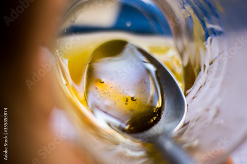 Honey in glass with spoon