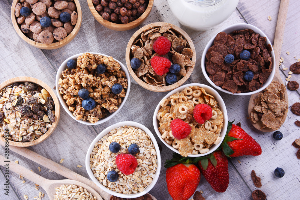 Fototapeta premium Bowls with different sorts of breakfast cereal products