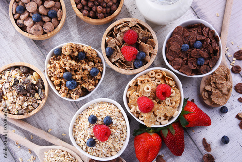 Bowls with different sorts of breakfast cereal products