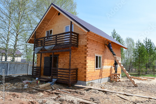 wooden house under construction, almost ready © bmd_17