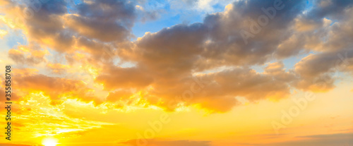 Yellow sky sunset clouds nature background.