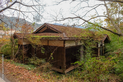 A Japanese style empty house abandoned in the woods.