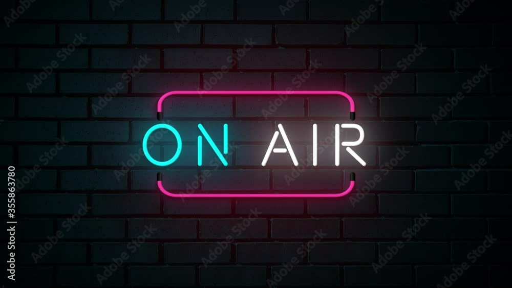 on air neon sign. Firing word on brick wall background. on air neon sign. Firing word on brick wall background.