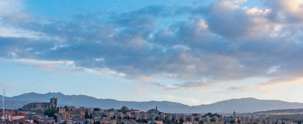 Panoramic of the city of Ávila at sunset with the Sierra de La Paramera in the background