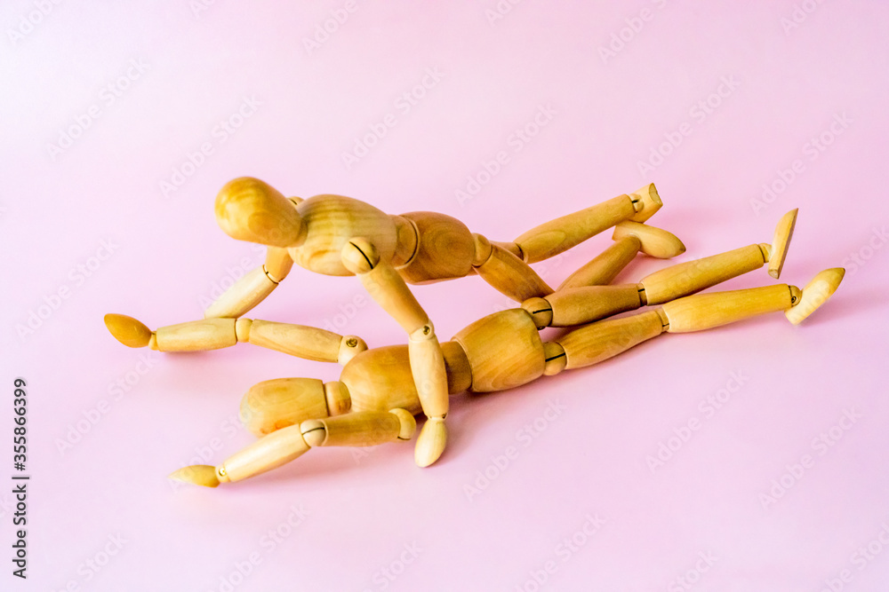 Wooden toy people have sex