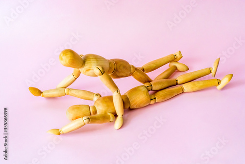 Obraz na płótnie Wooden toy people have sex w salonie