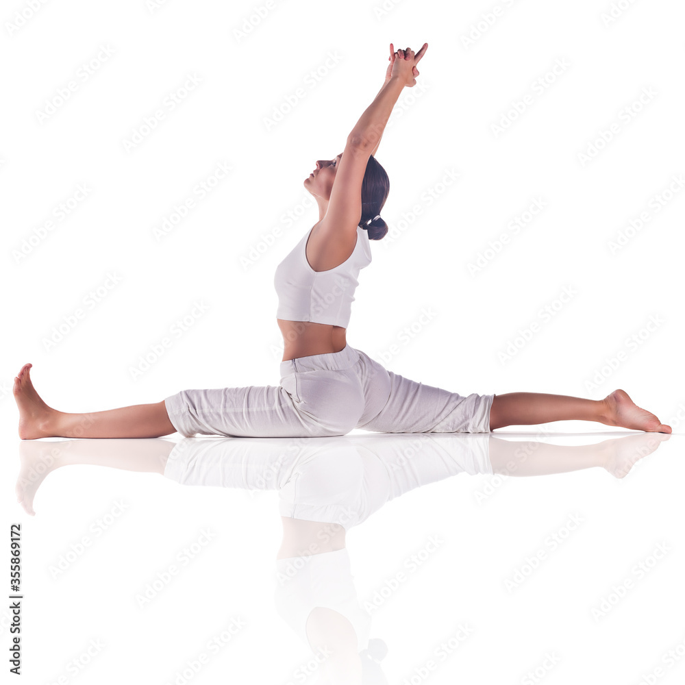 Naklejka premium Woman practicing yoga.