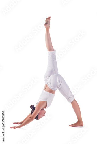 Woman practicing yoga.