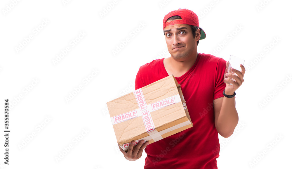 Handsome contractor holding fragile box isolated on white Handsome contractor holding fragile box isolated on white