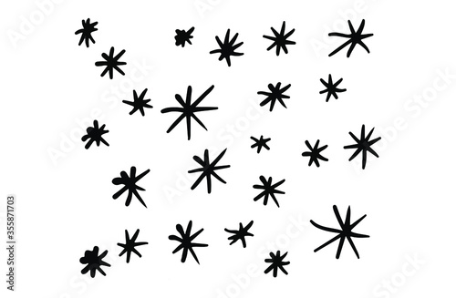 Hand-drawn black and white pattern of stars and snowflakes. © murmurik