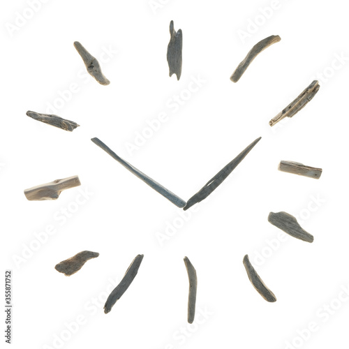 Driftwood Clock. Summer time. Dial made of driftwood sea snags isolated on white background.The interior  in a marine style.