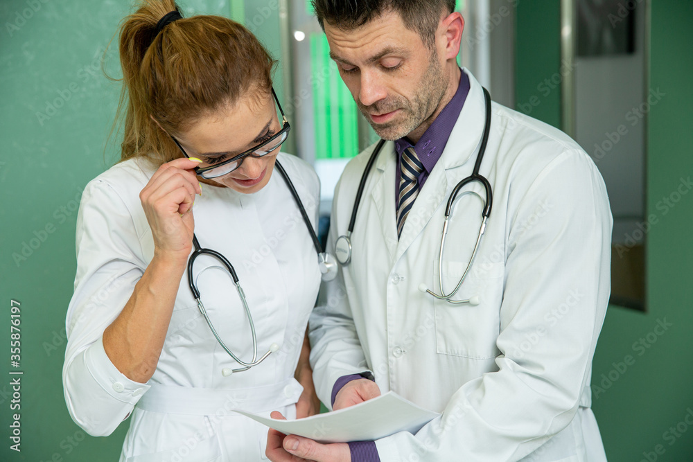 Team of Professional Surgeons and Nurses Suture Wound after Successful Surgery. Team of Professional Surgeons and Nurses Suture Wound after Successful Surgery.