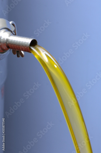 extraction of organic extra virgin oil after pressing the freshly picked olives
