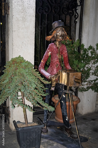 Sculpture of a photographer with an old camera in the Georgian restaurant in Tbilisi city in Georgia