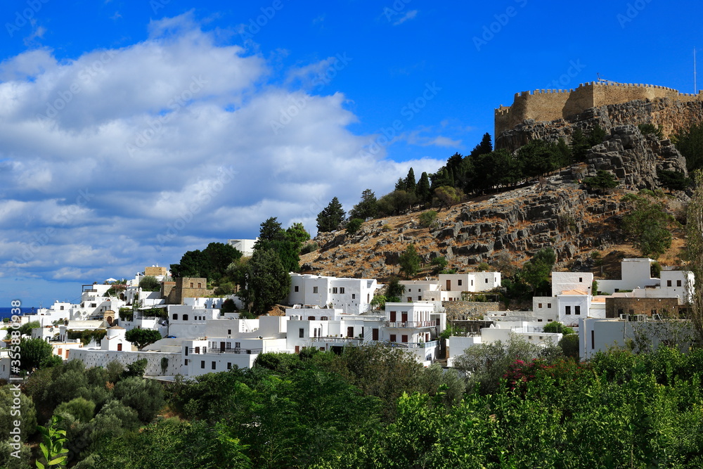Lindos, Rhodes island; Cute residential area with famous castle and narrow streets. Greece