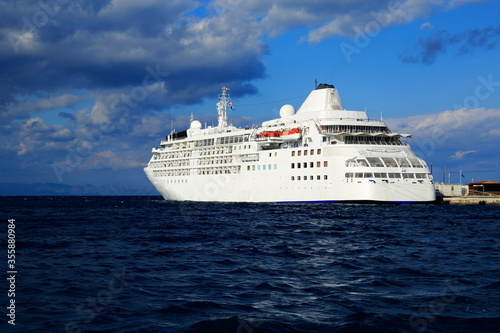 Fototapeta Naklejka Na Ścianę i Meble -  A cruise ship on trips between the islands of the Aegean. Greece
