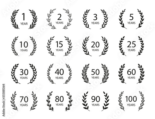 Set of anniversary laurel wreaths. Black and white anniversary symbols isolated on black background. 1,2,3,5,10,15,20,25,30,40,50,60,70,80,90,100 years. Template for award and congratulation design.